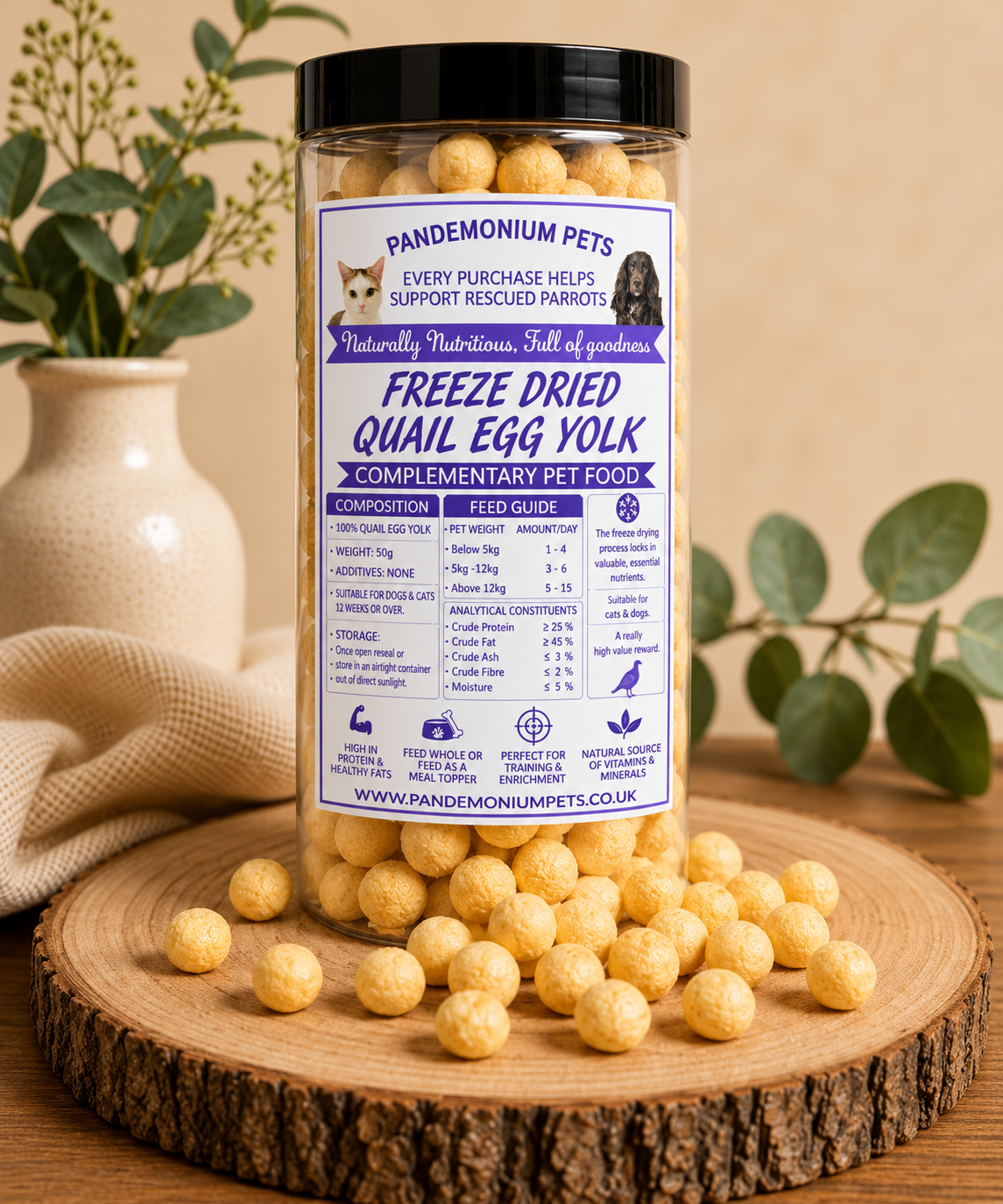 Freeze dried quail egg yolk in a Pandemonium Pets jar with quail egg yolk pieces on a wooden board