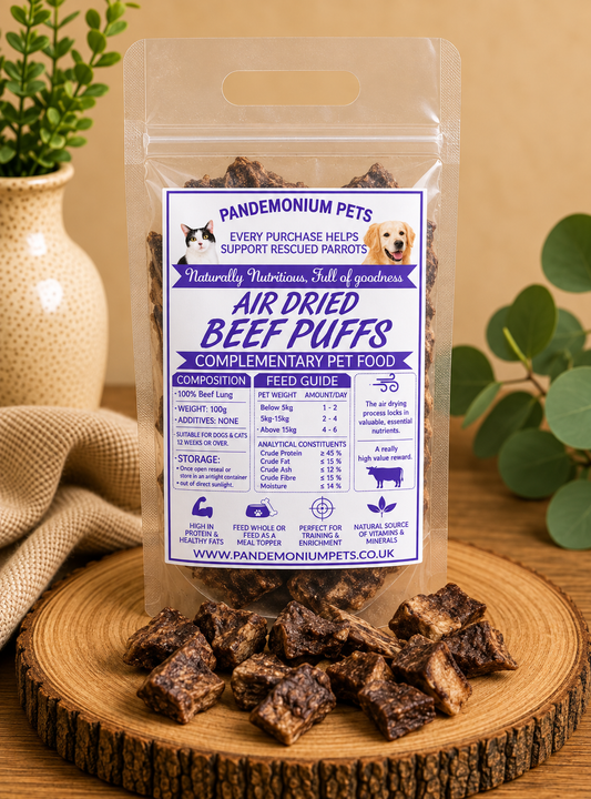 Air dried beef puffs in a resealable Pandemonium Pets pouch with beef puffs on a wooden board